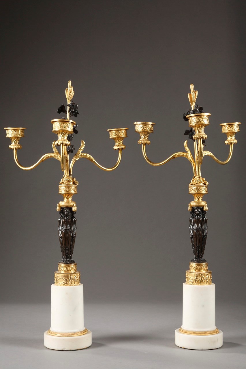 Pair of French Directoire bronze candelabras